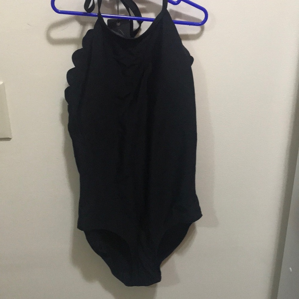 Black scalloped trimmed one piece with low back